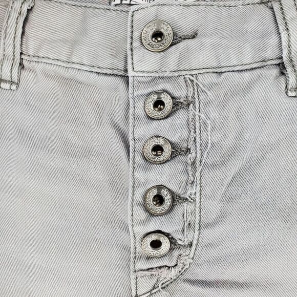 Free People Rugged Ripped Denim Shark Bite Shorts - Picture 5 of 13